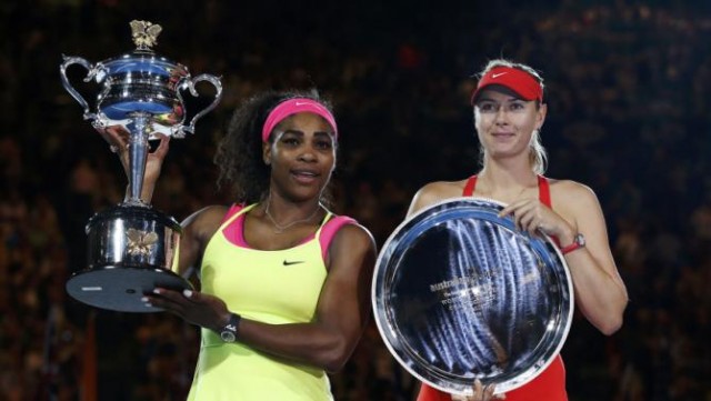 Williams of the U.S. and Sharapova of Russia pose with their trophies after their women's singles final match at the Australian Open 2015 tennis tournament in Melbourne